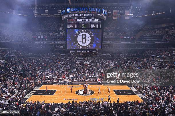 Wide shot of the Barclays Center interior during the opening jump ball in game three of the Eastern Conference Playoffs against the Brooklyn Nets in...