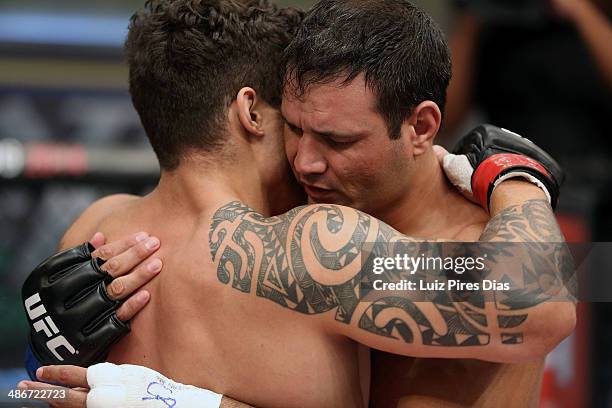 Team Wanderlei fighter Richardson Moreira consoles Team Sonnen fighter Job Kleber after Moreira defeated Kleber during season three of The Ultimate...