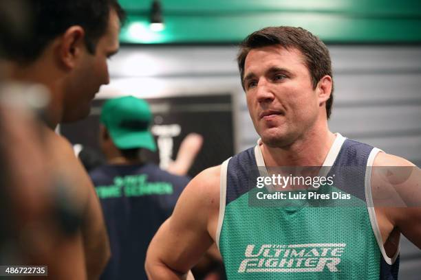 Coach Chael Sonnen speaks with Team Sonnen fighter Job Kleber after being defeated by Team Wanderlei fighter Richardson Moreira during season three...