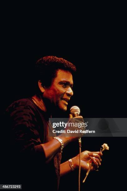 American singer Charley Pride on stage, circa 1980-1985.