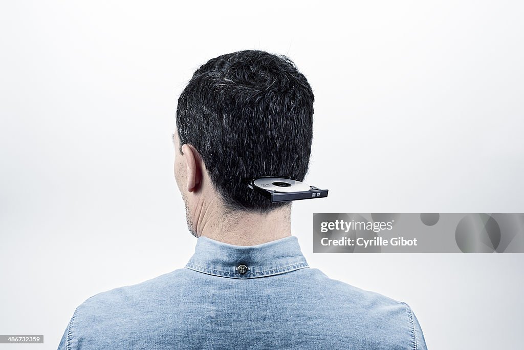 Man with inserted DVD player