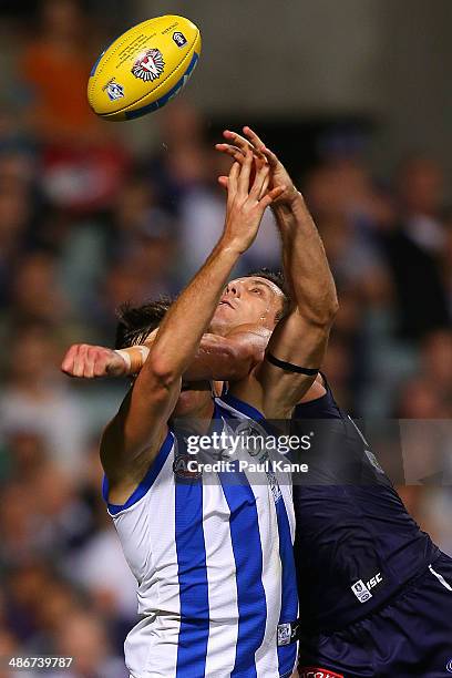 Matthew Pavlich of the Dockers spoils the mark for Joel Tippett of the Kangaroos during the round six AFL match between the Fremantle Dockers and the...