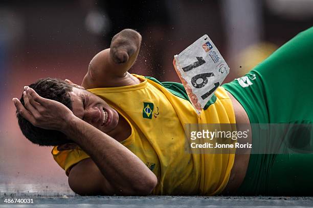 Petrucio Ferreira of Brazil falls and hurts himself during the Men's 200m T47 series during day two of the Open Caixa Loterias 2014 Paralympics...