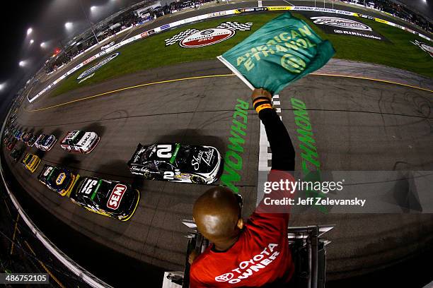 Brian Scott, driver of the Shore Lodge Chevrolet, and Dylan Kwasniewski, driver of the Rockstar Chevrolet, lead the field to the green flag to start...