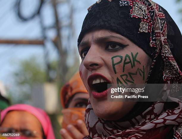 Pakistani Activists of a religious party Pakistan Awami Tehreek , rally to support Pakistan's army and Inter-Services Intelligence agency in Lahore,...