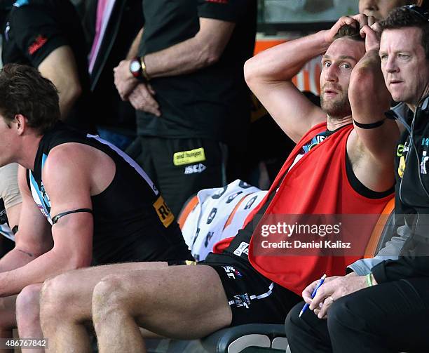 Jay Schulz of the Power looks on as he is substituted off with the red vest during the round 23 AFL match between the Port Adelaide Power and the...