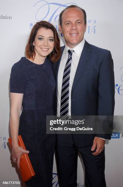 Actors Alyson Hannigan and Tom Papa arrive at the 19th Annual Jonsson Cancer Center Foundation's Taste For A Cure at Regent Beverly Wilshire Hotel on...