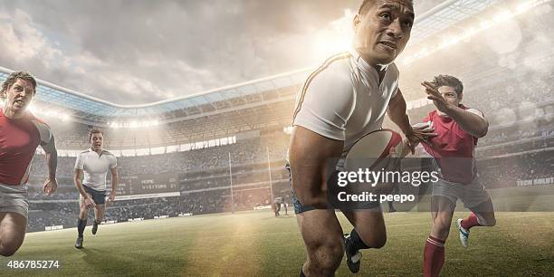 powerful rugby player hero during rugby match in stadium - rugby stadium stock pictures, royalty-free photos & images