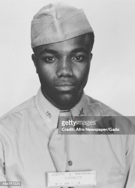 Joseph L Marshall head and shoulders portrait, taken during his service in World War 2 as part of the Tuskegee Airmen, the first squadron of African...