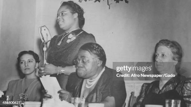 Judge Jane Bolin, Vivian Mason, civil rights leader Mary McLeod Bethune and Mary Beard deliver a speech at the Harlem YMCA during a meeting of the...