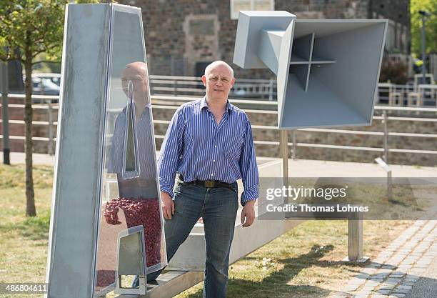 The Berlin artist Matthias Deumlich pictured with his artwork 'Teilchenbeschleuniger' on April 25, 2014 in Bingen, Germany. The 'Sculpture Triennial...