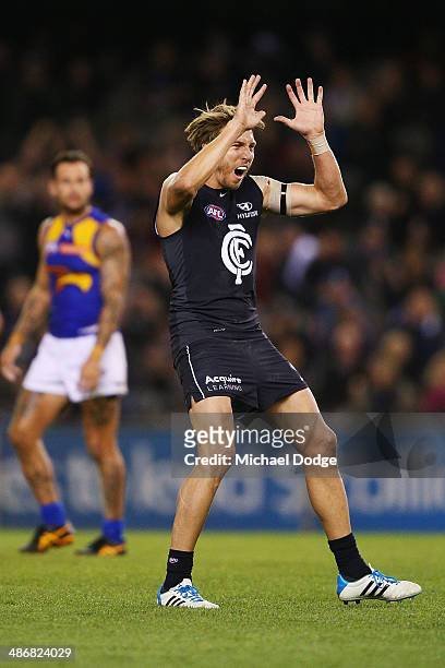 Dale Thomas of the Blues celebrates a goal during the round six AFL match between the Carlton Blues and the West Coast Eagles at Etihad Stadium on...