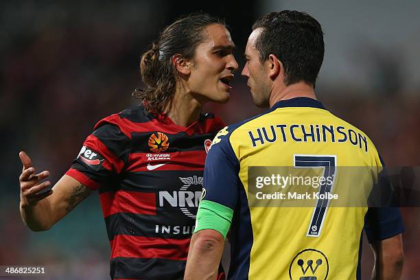 Jerome Polenz of the Wanderers and John Hutchinson of the Mariners exchange heated words during the A-League Semi Final match between the Western...