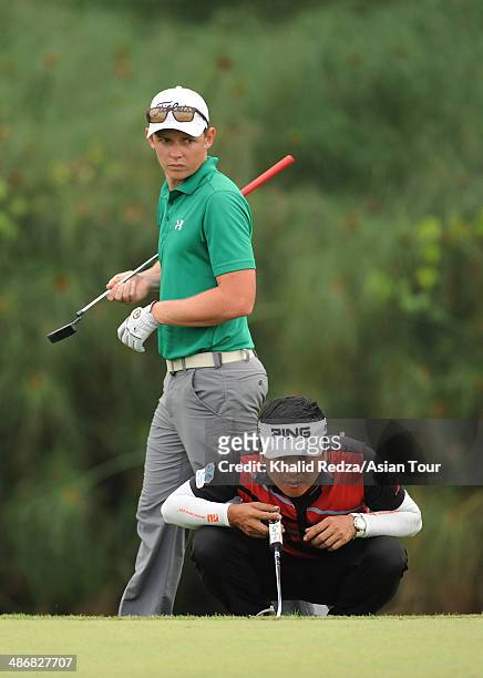 Lin Wen-tang of Chinese Taipei in action during round three of the CIMB Niaga Indonesian Masters at Royale Jakarta Golf Club on April 26, 2014 in...
