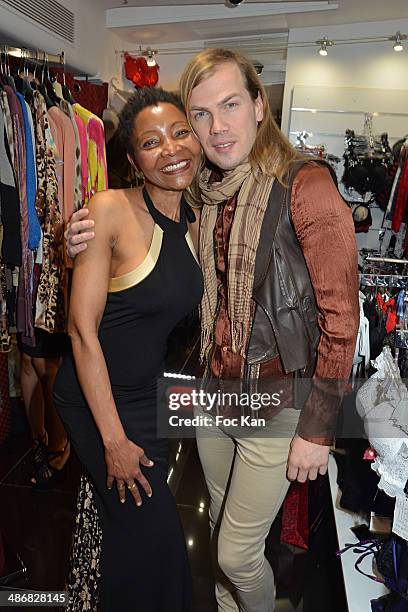 Fashion designers Regina Martin Djimbissi and Christophe Guillarme attend 'La Mode By Regina' Cocktail At the Regina's Shop Champs Elysee on April...