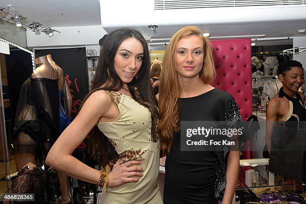 Models dressed by Regina pose during 'La Mode By Regina' Cocktail At the Regina's Shop Champs Elysee on April 25, 2014 in Paris, France.