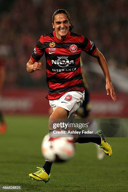 Jerome Polenz of the Wanderers chases the ball during the A-League Semi Final match between the Western Sydney Wanderers and the Central Coast...