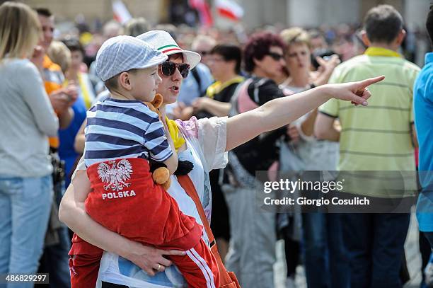 Tourists and pilgrims gather in Saint Peter's Square on April 26, 2014 in Vatican City, Vatican. Dignitaries, heads of state and Royals from Europe...