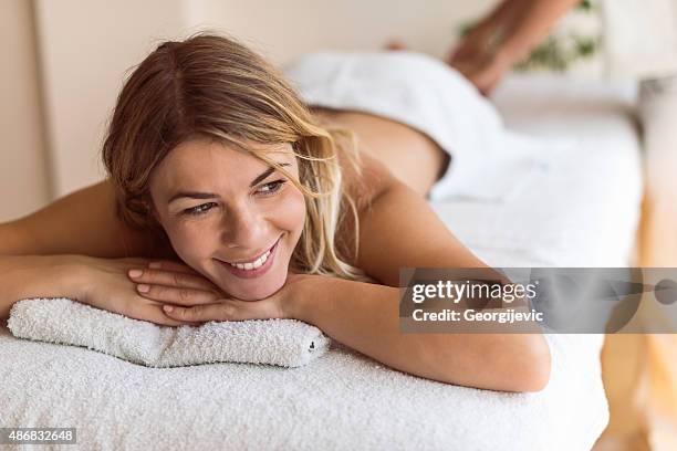 take a day just for yourself - massage therapist woman stock pictures, royalty-free photos & images