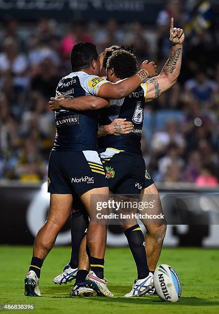 James Tamou of the Cowboys celebrates after scoring a try during the round 26 NRL match between the North Queensland Cowboys and the Gold Coast...