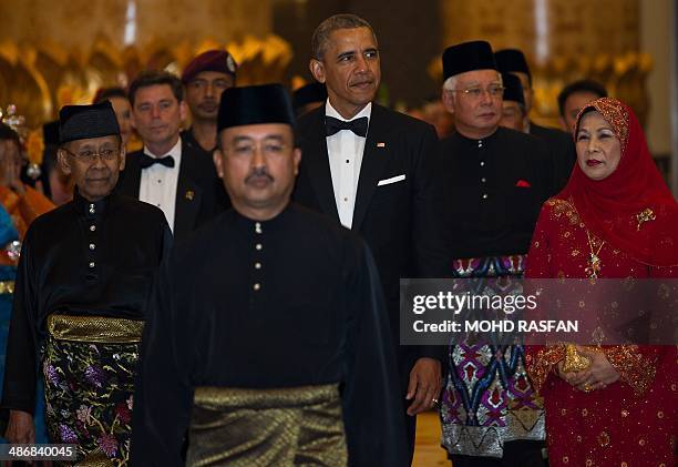 President Barack Obama and Malaysia's King Abdul Halim Mu'adzam Shah arrive during the official state dinner at the National Palace in Kuala Lumpur...