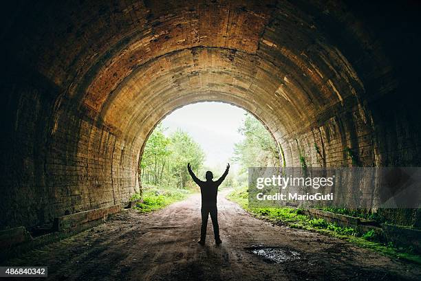 light at the end of the tunnel - light at the end of the tunnel stock pictures, royalty-free photos & images