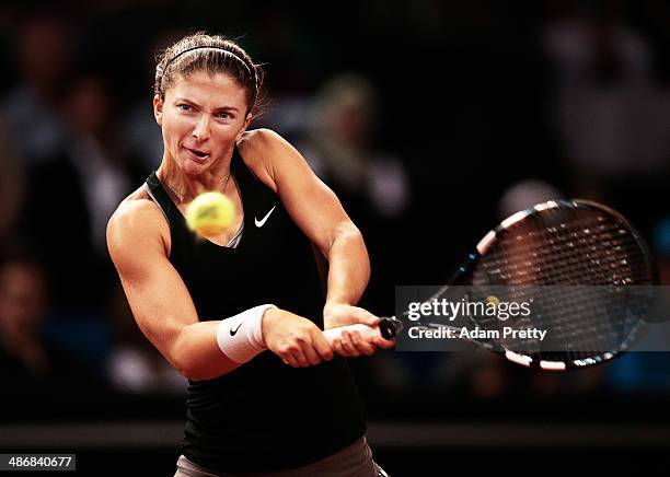 Sara Errani of Italy hits a forehand during her semi final match against Maria Sharapova of Russia on day six of the Porsche Tennis Grand Prix at...