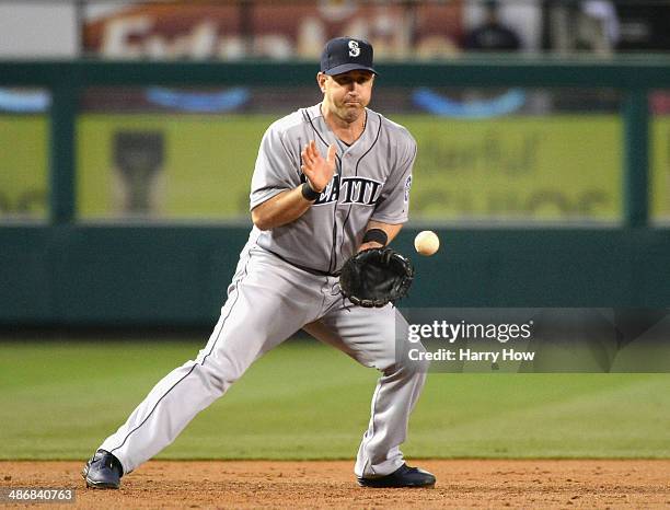 Willie Bloomquist of the Seattle Mariners fields a ground ball during the game against the Los Angeles Angels of Anaheim at Angel Stadium of Anaheim...