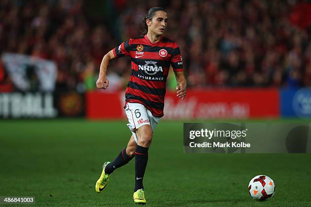 Jerome Polenz of the Wanderers runs with the ball during the A-League Semi Final match between the Western Sydney Wanderers and the Central Coast...