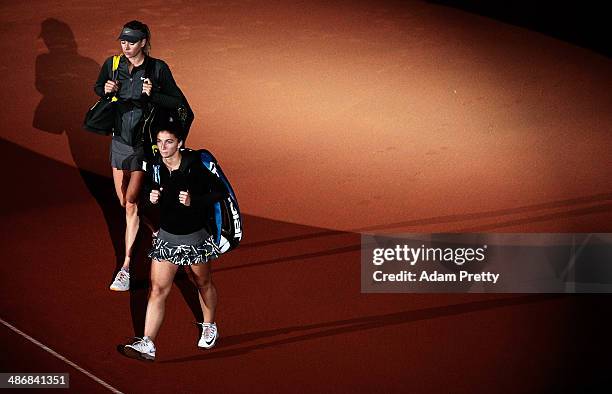 Sara Errani of Italy and Maria Sharapova of Russia before their semi final match on day six of the Porsche Tennis Grand Prix at Porsche Arena on...