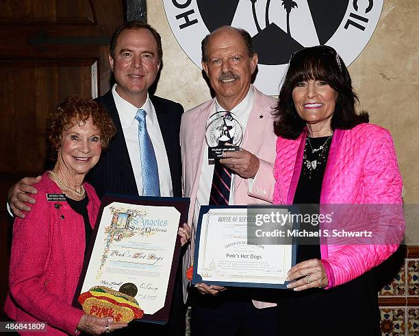 Owner of Pink's Hot Dogs Beverly Pink-Wolfe, Congressman Adam Schiff, Pink's owners Richard and Gloria Pink pose during their attendance at the...