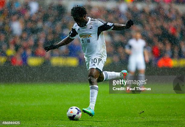 Wilfried Bony of Swansea City scores the opening goal during the Barclays Premier League match between Swansea City and Aston Villa at Liberty...