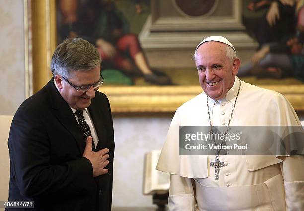Pope Francis meets President Of Poland Bronislaw Komorowski at his private library in the Apostolic Palace on April 26, 2014 in Vatican City,...