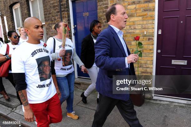 Singer Jade Jones and Simon Hughes MP march through East London with famly and supporters on April 26, 2014 in London, England. They are marching to...