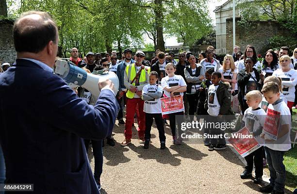 Simon Hughes MP addresses supporters of singer Jade Jones as they prepare to march through East London on April 26, 2014 in London, England. They are...