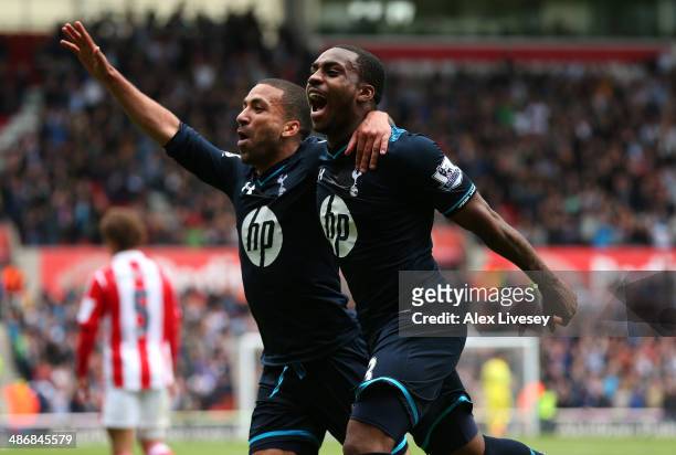 Danny Rose of Tottenham Hotspur celebrates with Aaron Lennon after scoring the opening goal during the Barclays Premier League match between Stoke...