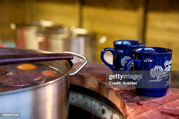 gluhwein at christmas market in trento, italy - mulled wine stock pictures, royalty-free photos & images