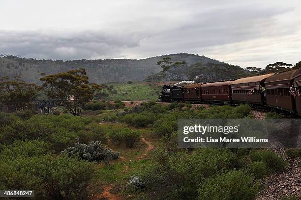 Passengers of The Ghan take a day trip on the Pichi Richi steam train through the Flinders Ranges on April 26, 2014 in Port Augusta, Australia. The...