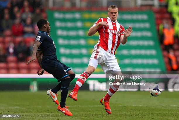 Ryan Shawcross of Stoke City fouls Danny Rose of Tottenham Hotspur and is sent off after receiving a second yellow card during the Barclays Premier...