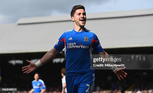 Shane Long of Hull celebrates after equalising during the Barclays Premier League match between Fulham and Hull City at Craven Cottage on April 26,...