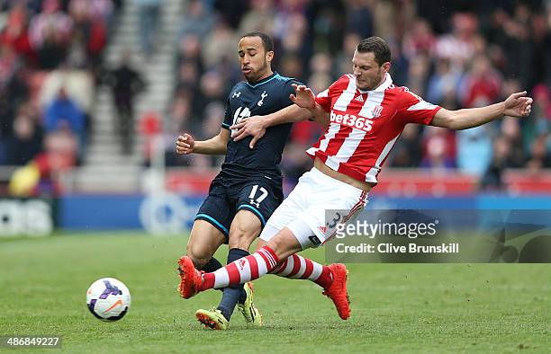 Erik Pieters of Stoke City in action with Andros Townsend of Tottenham Hotspur during the Barclays Premier League match between Stoke City and...
