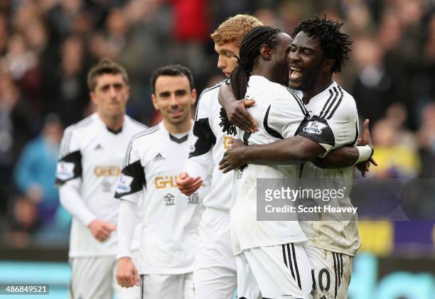 Wilfried Bony of Swansea City celebrates scoring their fourth goal during the Barclays Premier League match between Swansea City and Aston Villa at...