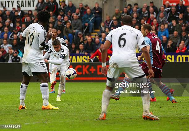 Pablo Hernandez of Swansea City scores their third goal during the Barclays Premier League match between Swansea City and Aston Villa at Liberty...