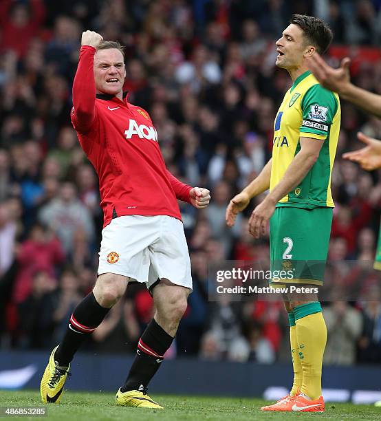 Wayne Rooney of Manchester United celebrates scoring their second goal during the Barclays Premier League match between Manchester United and Norwich...