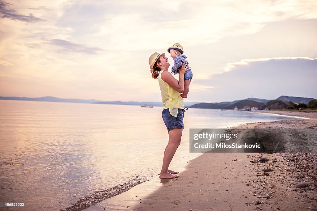 Mom with baby on the beach