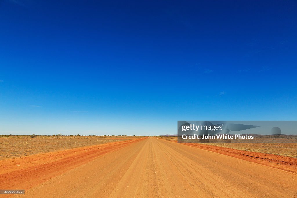 Red dusty outback road. Central Australia
