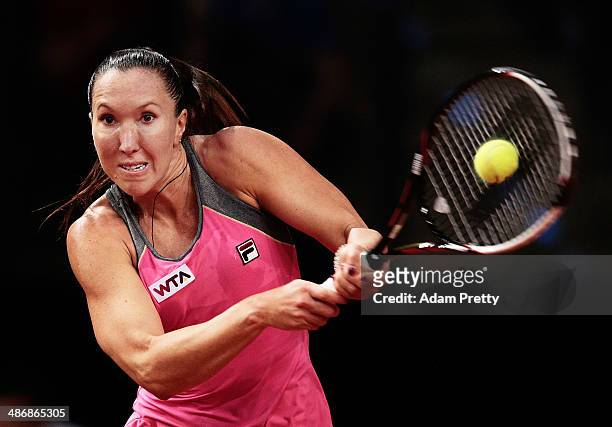 Jelena Jankovic of Serbia hits a backhand during her semi final match against Ana Ivanovic of Serbia on day six of the Porsche Tennis Grand Prix at...