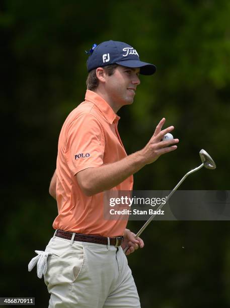 Ben Martin acknowledges the crowd after putting on the 1st during Round Three of the Zurich Classic of New Orleans at TPC Louisiana on April 26, 2014...