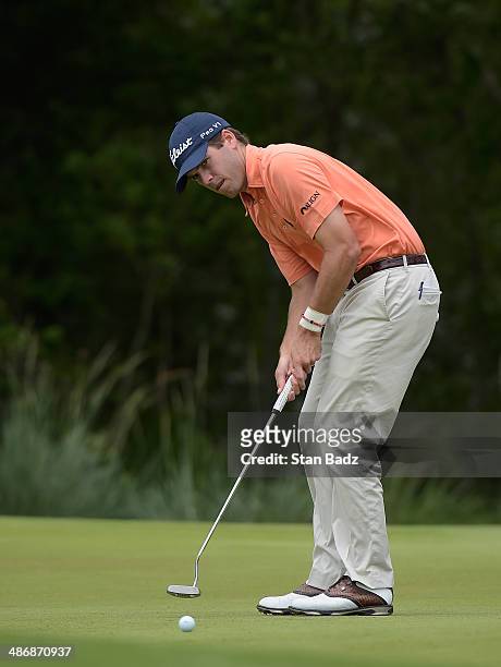 Ben Martin putts on the 1st during Round Three of the Zurich Classic of New Orleans at TPC Louisiana on April 26, 2014 in Avondale, Louisiana.
