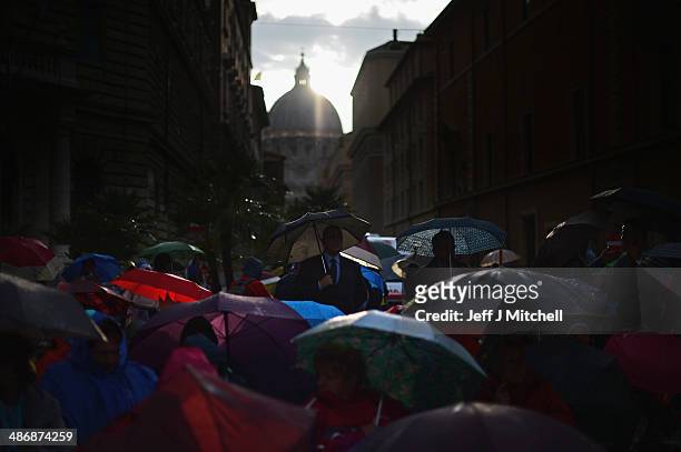 Pilgrims listen to a mass outside a the Polish Church, Santo Spirito in Sassia, Sanctuary of Divine Mercy near to Saint Peter's Square on April 26,...